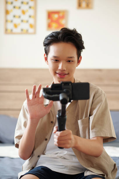 istock Teenage Boy Filming Video 1419302197