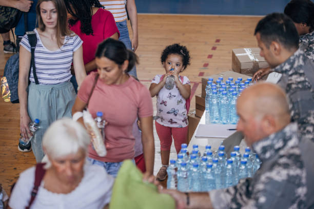istock People receiving donations after natural disaster 1419304200