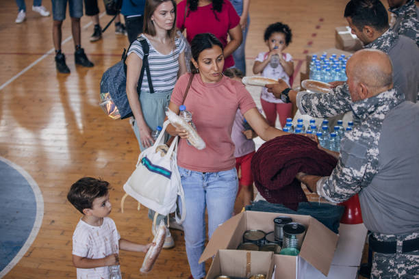 istock People receiving donations after natural disaster 1419304287