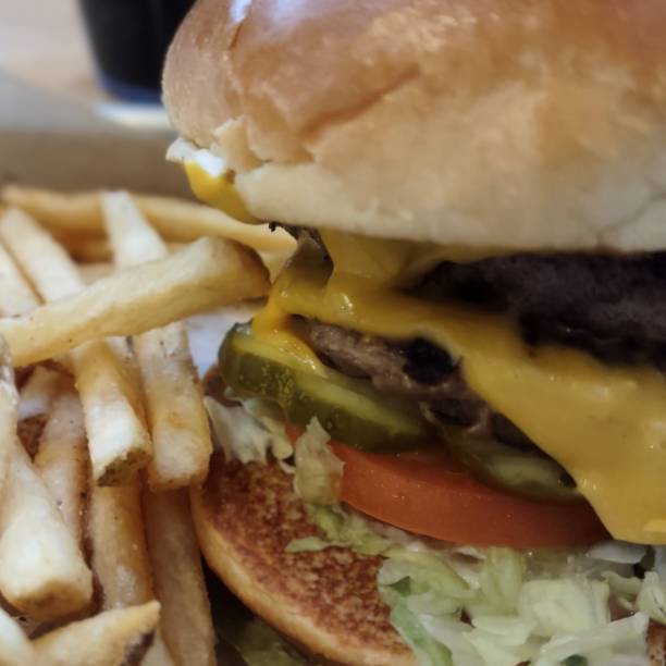 istock Cheeseburger and fries 1419306763