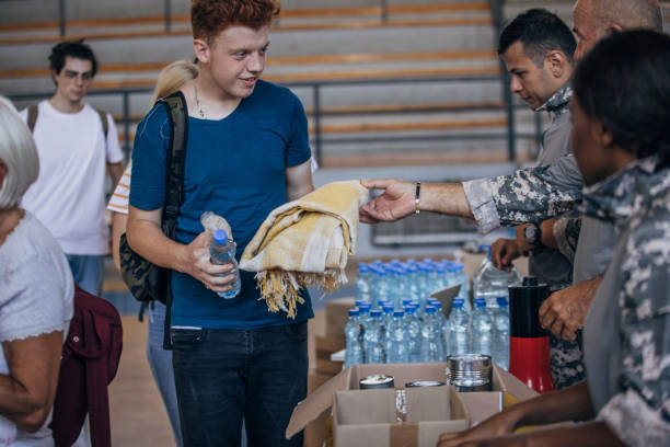 istock People receiving donations after natural disaster 1419309994