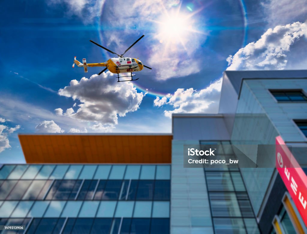 medical emergency medical emergency 911 call helicopter landing at the hospital Helicopter Stock Photo