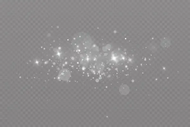 Vector illustration of Dust sparks and stars shine with a special light. Christmas light effect. Glittering particles of magic dust.Vector sparkles on a transparent background.