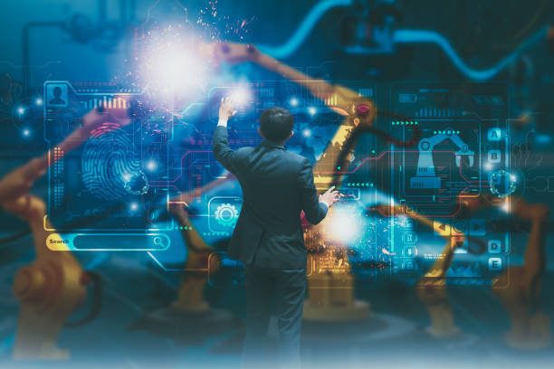 Industry engineer in factory,using smart interface screen control automated robot arm machine learning operation,concept business and industry 4.0,Artificial intelligence or AI,with 5G network ingeniero de la industria en la fábrica, utilizando el control de pantalla de interfaz inteligente automatizado brazo robótico operación de aprendizaje automático, concepto de negocio e industria 4.0, inteligencia artificial o ia, con red 5g