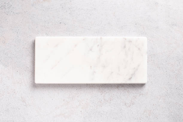 istock Empty light marble podium for product display on gray background 1419320897