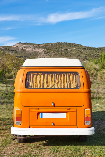 Vintage camper vanin the countryside. Recreational vehicle. Lifestyle