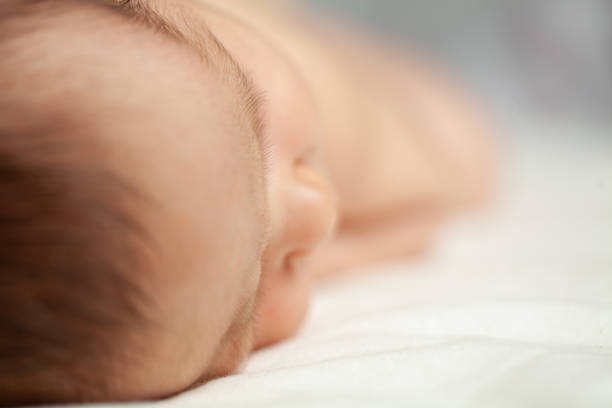 istock Newborn baby closeup, soft focus 1419323160
