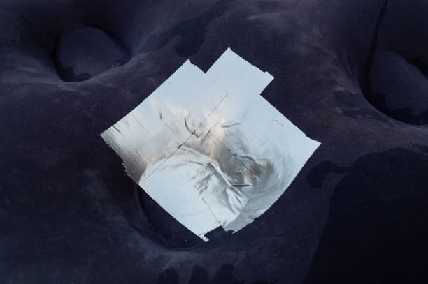 istock repair with grey adhesive tape 1419327335
