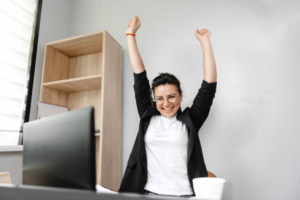 istock Smiling female freelancer using laptop, researching online, working from home, happy casual millennial guy typing on laptop PC, browsing the internet, looking at screen, enjoying remote work, sitting at desk 1419328540