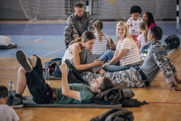 istock Civilians with soldiers after natural disaster 1419329143