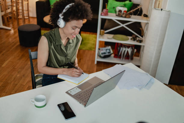 istock Multiracial woman listening to online education training class 1419329643