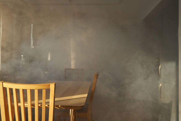 istock Smoked room with wooden table and chairs 1419329667