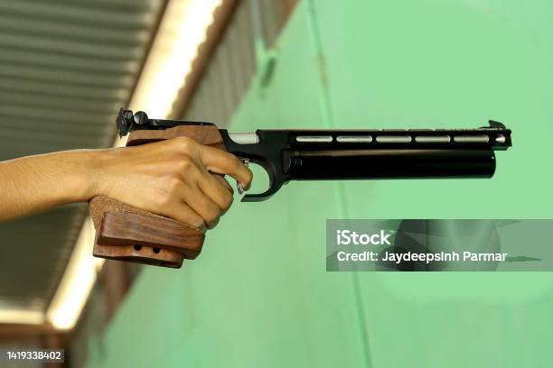 10m Air Pistol Shooting Practice Shooter Stock Photo - Download Image Now - Air Rifle, Aiming, Ammunition