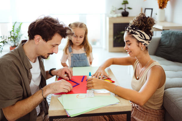 istock Happy family spending fun time at home 1419339813