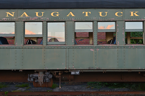 Retro train departs from railway station building. Moscow.