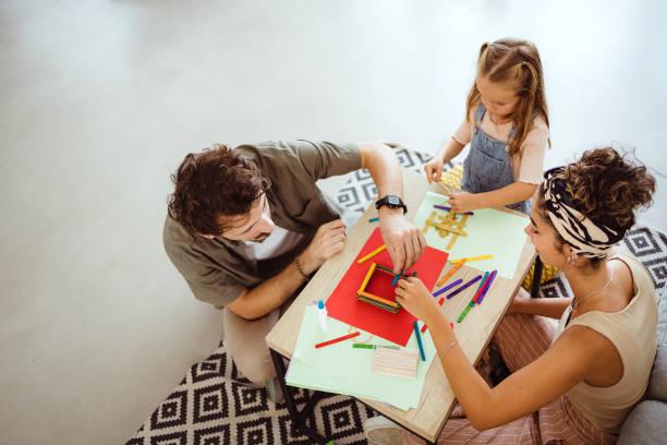 istock Happy family spending fun time at home 1419340378