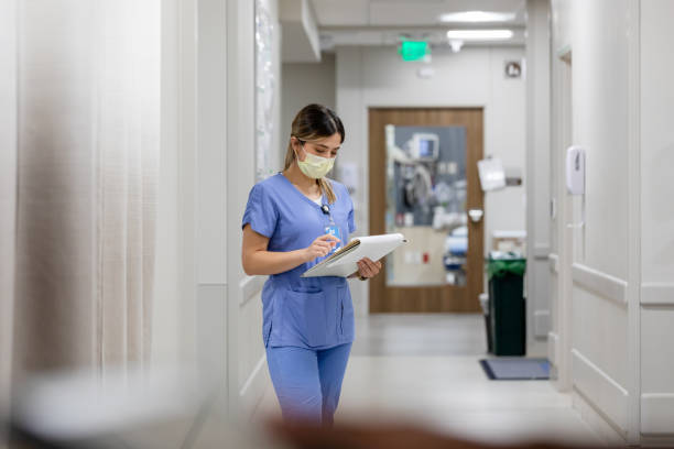 istock Doctor reads medical chart 1419342666