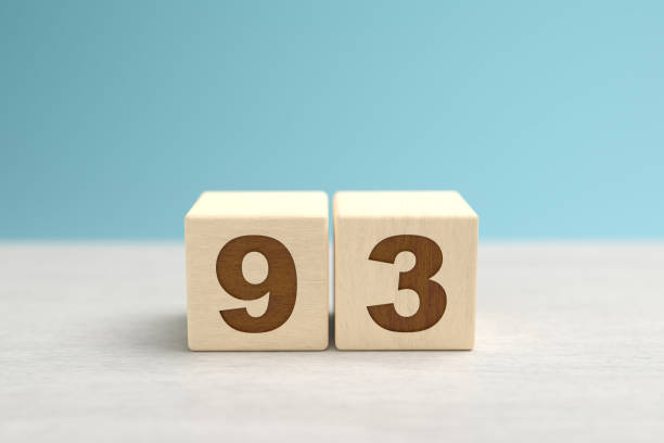 istock Wooden toy blocks forming the number 93. 1419342880