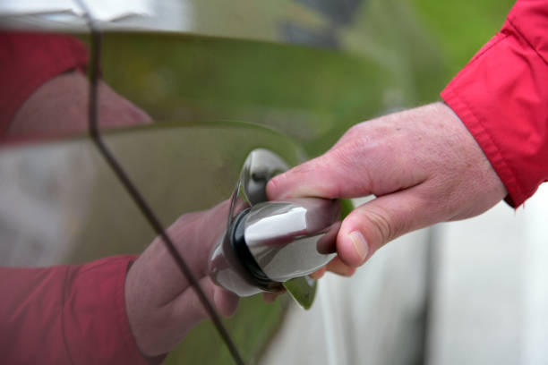 istock A man opens the door of a passenger car 1419344691