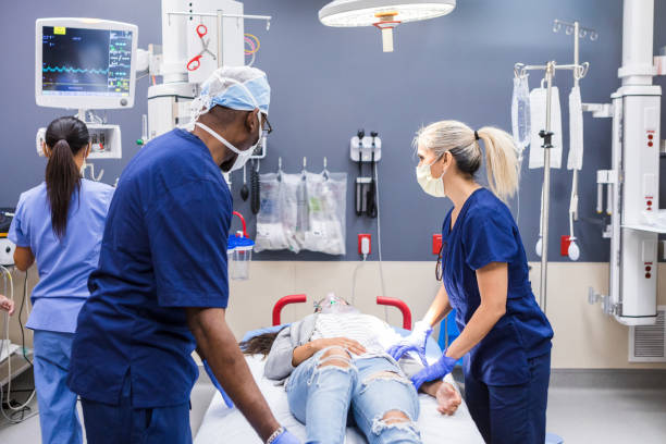 istock Diverse emergency room team works on female patient 1419346062