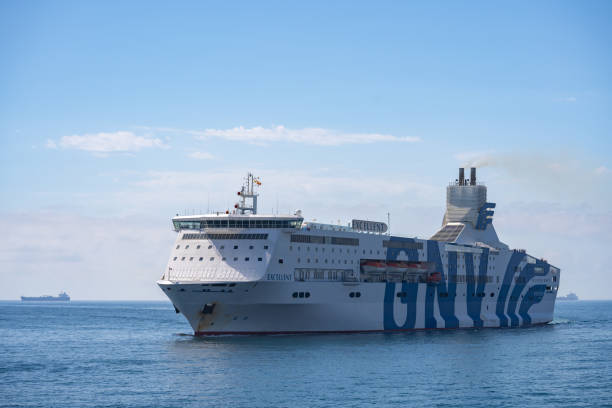 GNV Ferry vessel ship depart Barcelona port Vell. Barcelona, Spain - May 29, 2022 stock photo