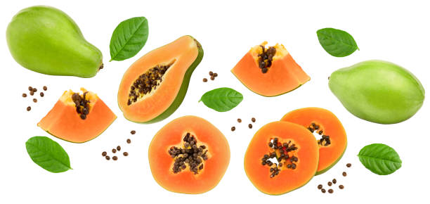 istock flying sliced ripe papaya fruit isolated on white background. exotic fruit. clipping path 1419347059