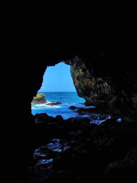 istock beach with full frame coral cave holes 1419347880