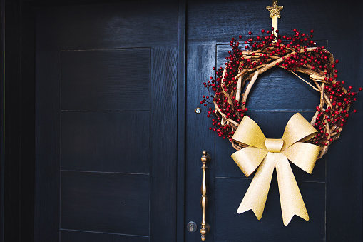 Festival Vibes -  Beautifully decorated wreath at the home entrance door