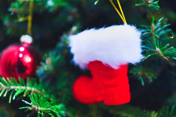 Closeup image of Christmas Ornaments on a beautifully decorated tree