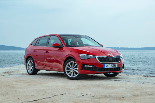 Split, Croatia - 9th April, 2019: Skoda Scala (Volkswagen Group) stopped next to the sea. The Scala is a popular compact car from Skoda.