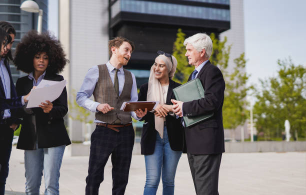 istock Multi generational business people working outside of office building 1419351586