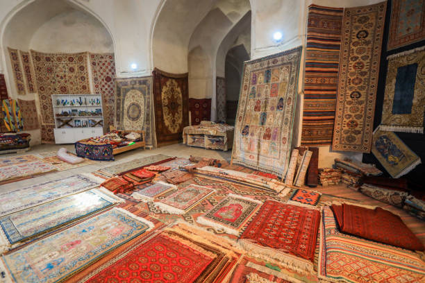 Traditional Oriental hand-woven Carpets with Geometric Patterns in Bukhara stock photo
