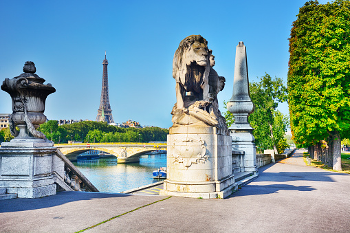 Statue of a lion (1900) on the Pont Alexander III bridge by Georges Gardet in Paris, France