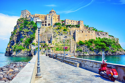Aragonese Castle is a medieval castle next to Ischia island, at the Gulf of Naples, Italy. Composite photo