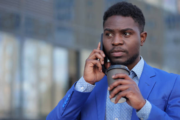 istock African American man at break from office chaos with coffee 1419366464