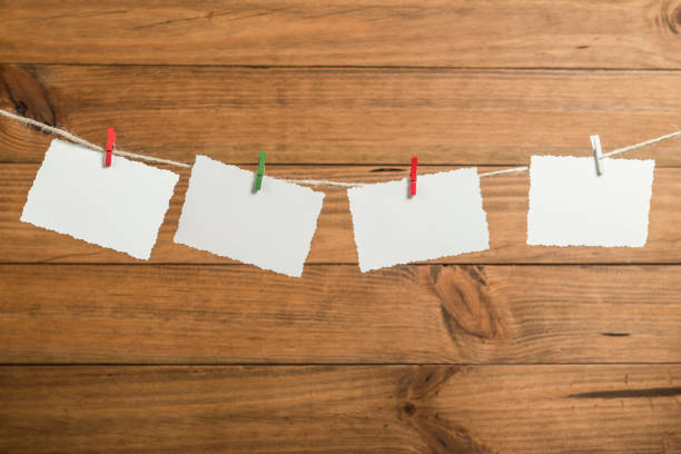 istock Christmas background with greeting cards placed on a rope. 1419366575