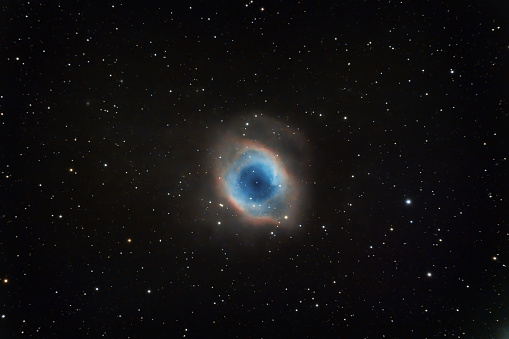 The Helix Nebula (also known as NGC 7293 or Caldwell 63) is a planetary nebula (PN) located in the constellation Aquarius.\nTelescope 132 mm\nDSLR Camera\nExposure 600 seconds\n7 shots combined into a picture