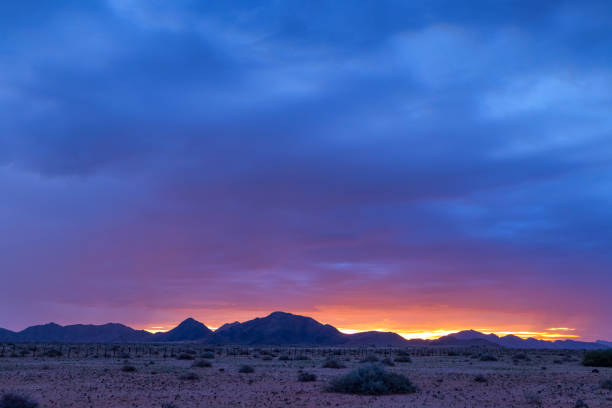 istock Yellow and blue clouds after sunset 1419368473