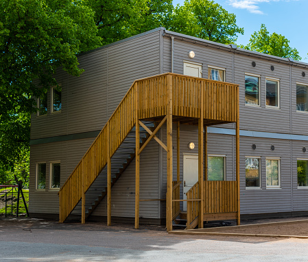 Gothenburg, Sweden - May 29 2022: Temporary barracks classrooms at a school.
