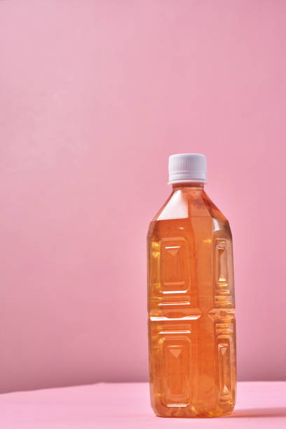 istock Plastic Bottle of Ice Tea on Vibrant Background 1419370725