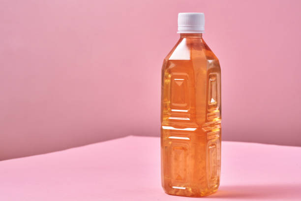 istock Plastic Bottle of Ice Tea on Vibrant Background 1419370727