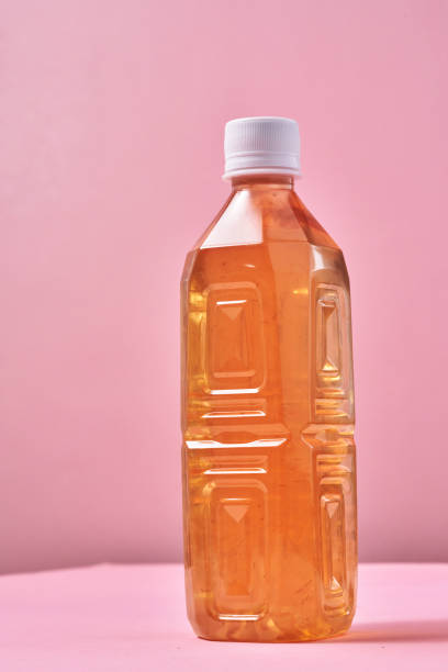 istock Plastic Bottle of Ice Tea on Vibrant Background 1419370742