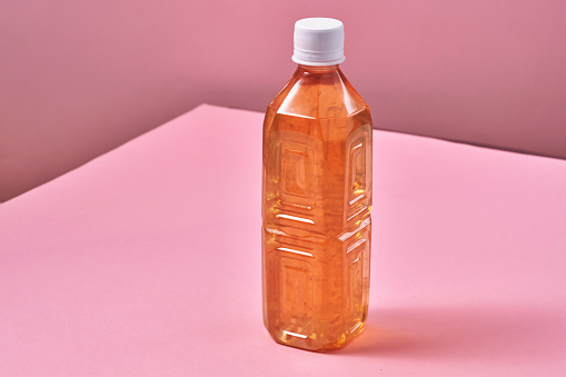 Plastic Bottle of Ice Tea on Vibrant Background