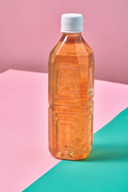 istock Plastic Bottle of Ice Tea on Vibrant Background 1419370765