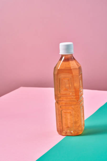 istock Plastic Bottle of Ice Tea on Vibrant Background 1419370780
