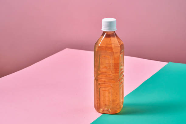 istock Plastic Bottle of Ice Tea on Vibrant Background 1419370787