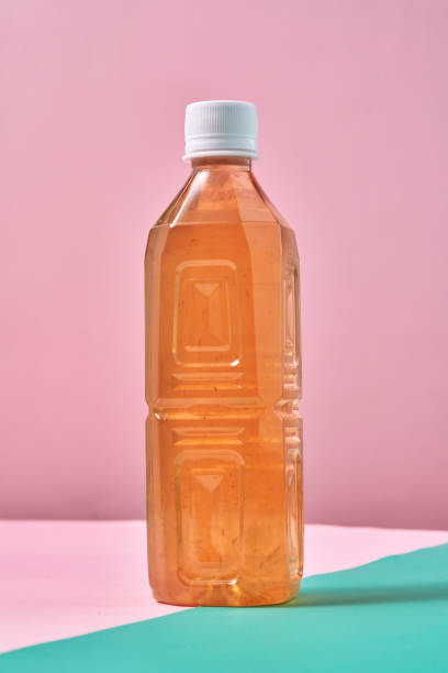 istock Plastic Bottle of Ice Tea on Vibrant Background 1419370792