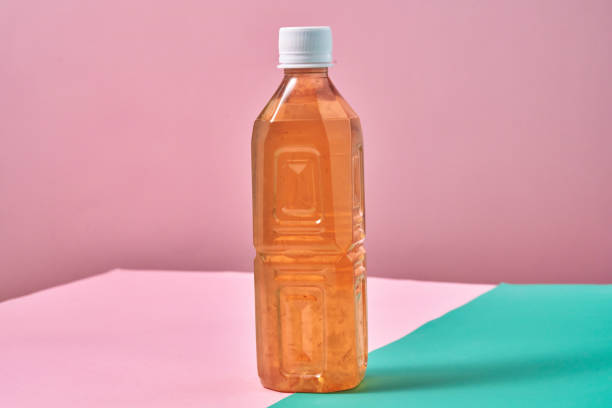 istock Plastic Bottle of Ice Tea on Vibrant Background 1419370797