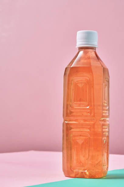 istock Plastic Bottle of Ice Tea on Vibrant Background 1419370801