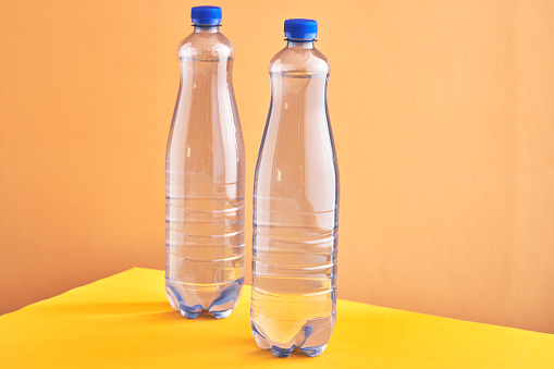 Plastic Bottle of Water on Vibrant Background